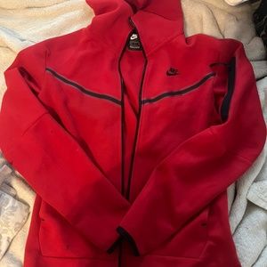 red mens/woman’s nike tech tracksuit